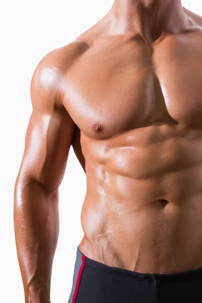 Mid section of shirtless muscular man — Stock Photo, Image