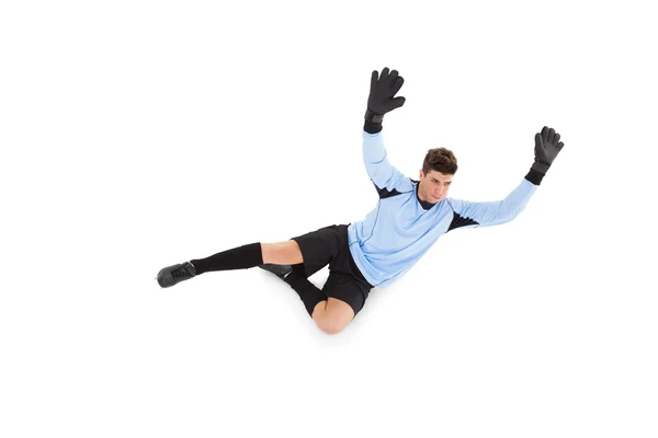 Goalkeeper in blue making a save — Stock Photo, Image