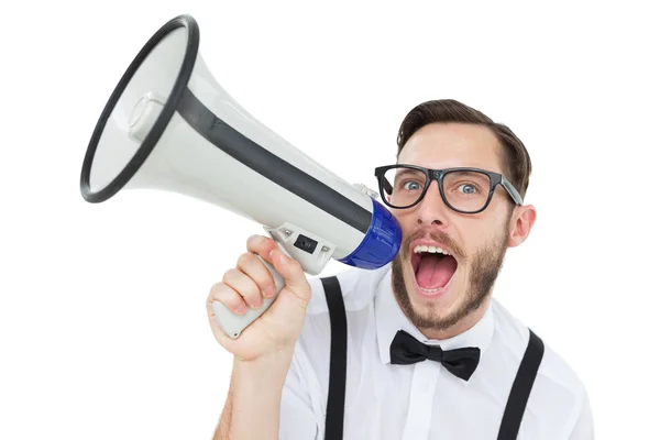 Homem de negócios Geeky gritando através de megafone — Fotografia de Stock