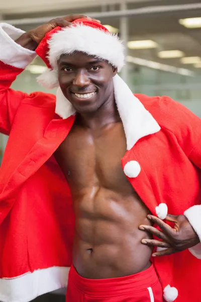 Macho homme en costume de Père Noël à la salle de gym — Photo