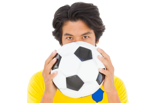 Joueur de football en ballon jaune — Photo