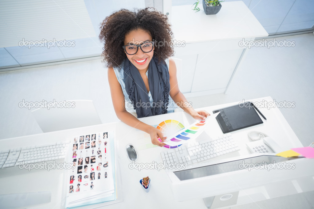 Pretty designer working at her desk — Stock Photo © Wavebreakmedia ...