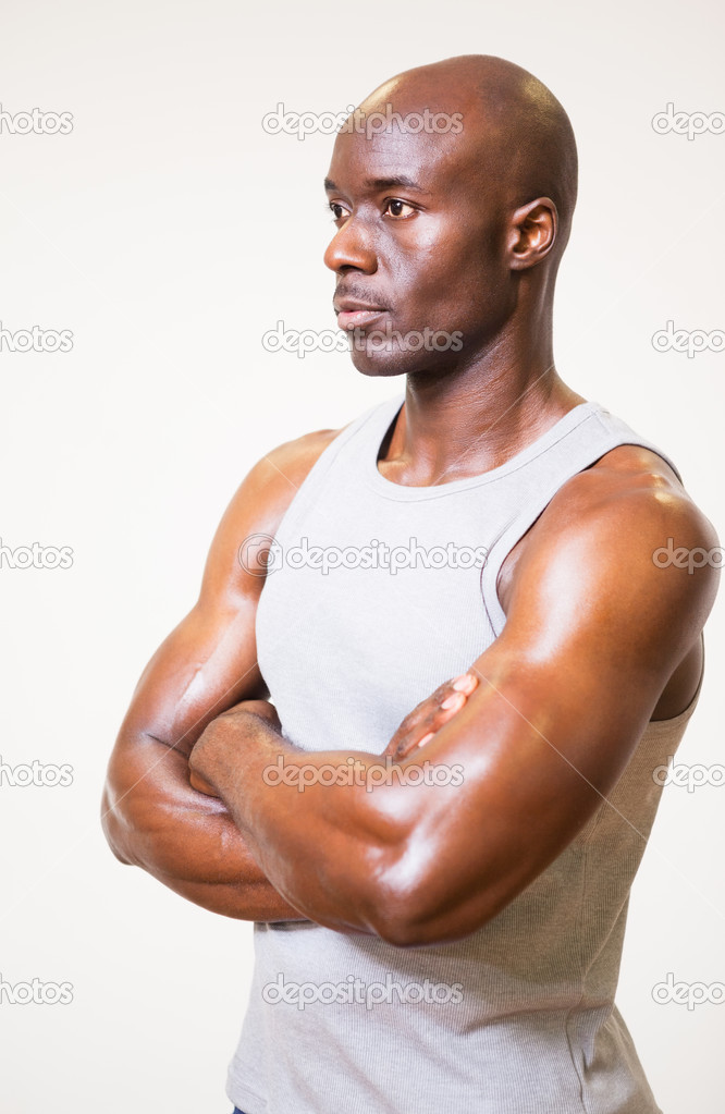 Serious Muscular Man With Arms Crossed Looking Away Stock Photo Image By C Wavebreakmedia Serious Muscular Man With Arms Crossed Looking Away Stock Photo Image By C Wavebreakmedia