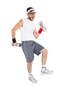 Geeky hipster lifting dumbbells in sportswear clipart