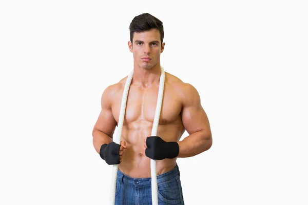 Portrait of a serious shirtless young muscular man — Stock Photo, Image