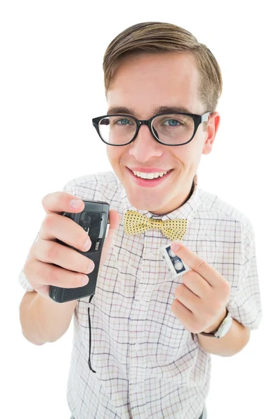 Geeky hipster speaking into dictaphone — Stock Photo, Image