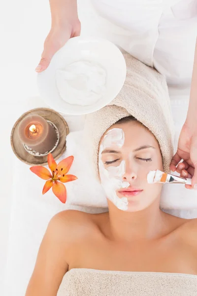 Attractive young woman receiving treatment at spa center — Stock Photo, Image