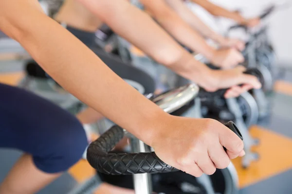 Spin class working out in a row — Stock Photo, Image