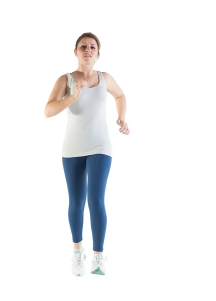 Longitud total de una joven corriendo — Foto de Stock