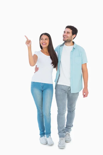 Happy casual couple walking together — Stock Photo, Image