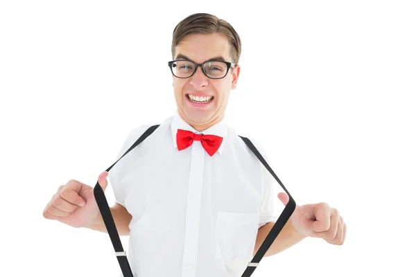 Geeky hipster trekken zijn bretels — Stockfoto