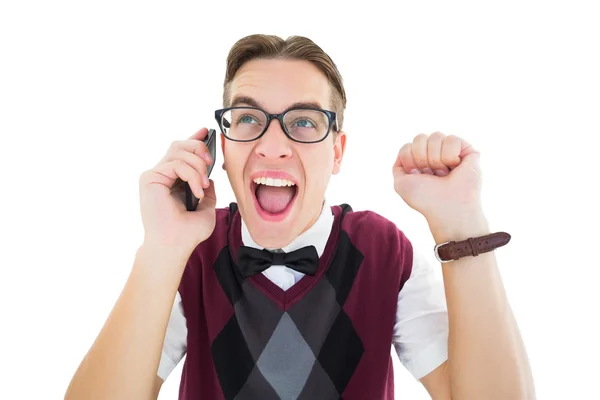 Excited geeky hipster talking on the phone — Stock Photo, Image