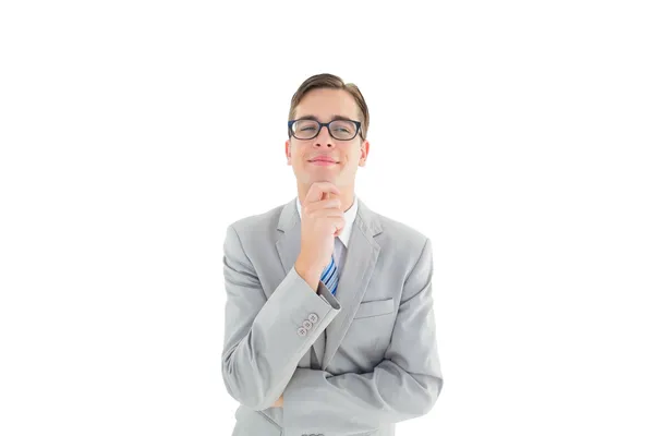 Geeky gelukkig zakenman denken met hand op kin — Stockfoto