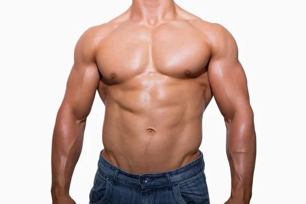 Mittelteil eines hemdlosen, muskulösen Mannes — Stockfoto