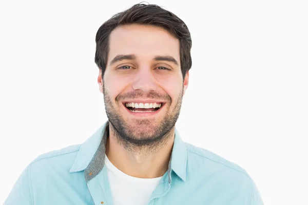 Hombre casual feliz sonriendo a la cámara — Stock fotografie