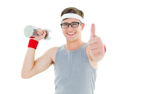 Geeky hipster poseren in sportkleding met dumbbell — Stockfoto