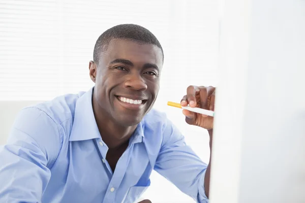 Happy businessman with electronic cigarette — Stock Photo, Image