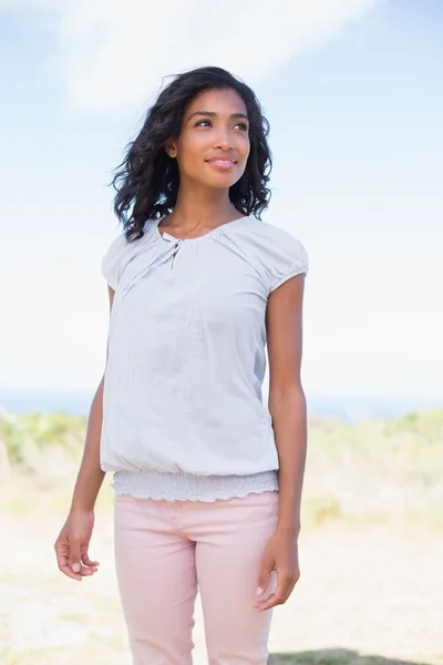 Casual pretty woman standing in the wind — Stock Photo, Image