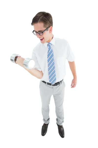 Geeky happy businessman lifting dumbbell — Stock Photo, Image