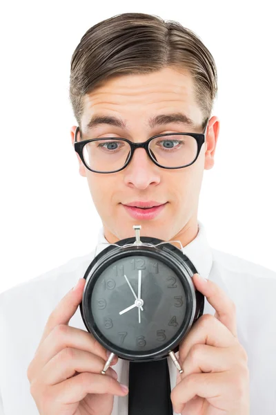 Geeky zakenman bedrijf alarm clock — Stockfoto