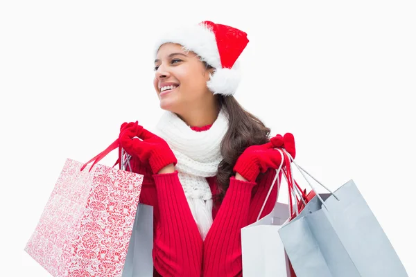 Mujer hermosa festiva sosteniendo bolsas de compras — Foto de Stock