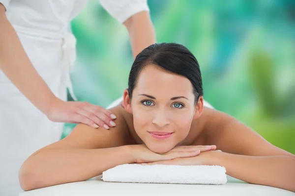 Brunette enjoying back massage — Stock Photo, Image