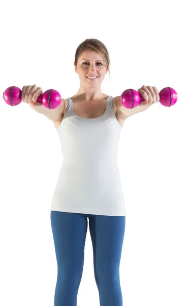 Smiling young woman with dumbbells — Stock Photo, Image