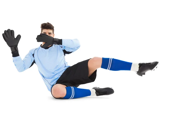 Portiere in blu facendo un salvataggio — Foto Stock