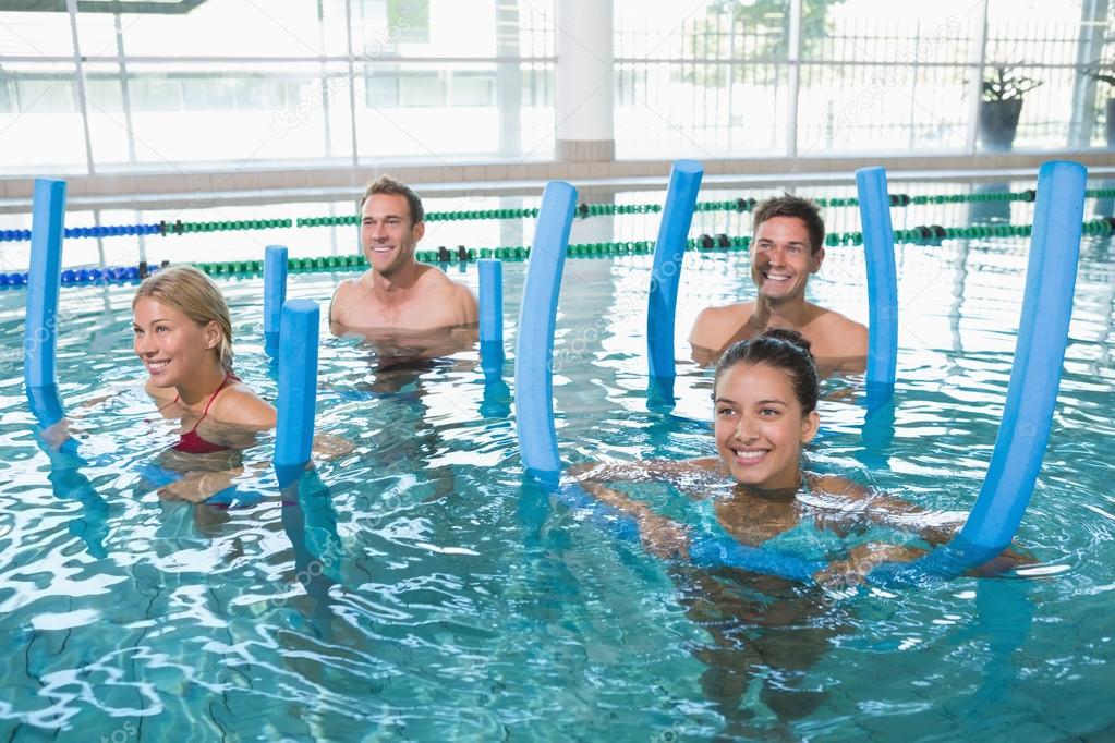 Fitness class doing aqua aerobics — Stock Photo © Wavebreakmedia