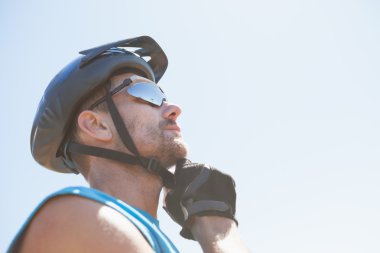 Fit cyclist fixing strap on helmet clipart