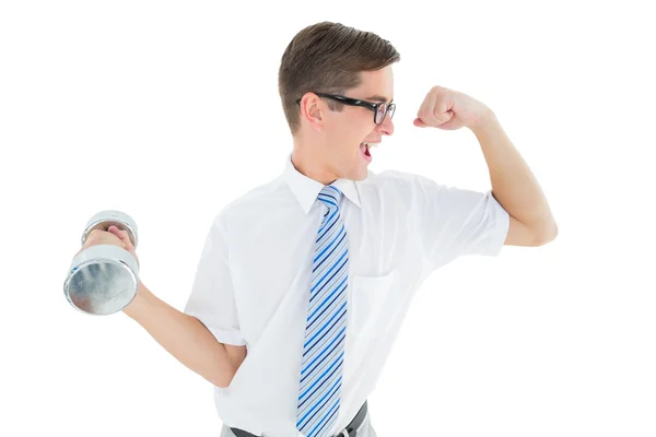 Geeky happy businessman lifting dumbbell — Stock Photo, Image