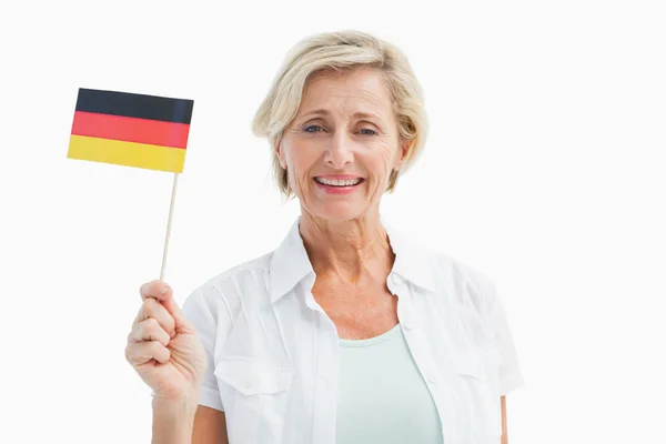Happy mature woman holding german flag — Stock Photo, Image