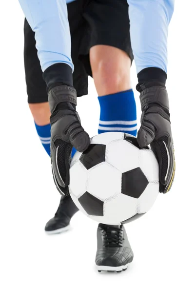 Goalkeeper picking up the ball — Stock Photo, Image