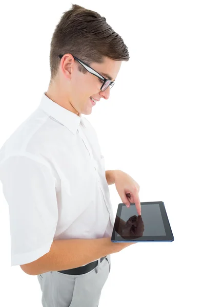 Geeky businessman using his tablet pc — Stock Photo, Image