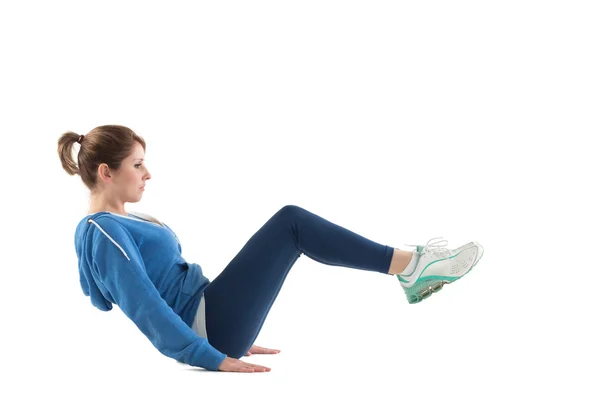 Visão lateral da mulher no núcleo equilíbrio pilates pose — Fotografia de Stock
