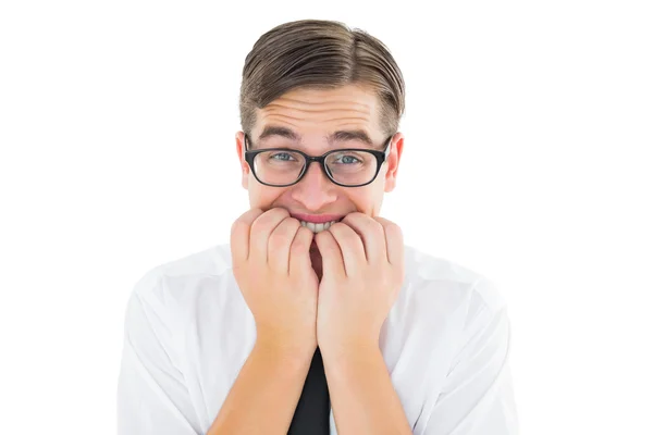 Geeky businessman looking nervously at camera — Stock Photo, Image