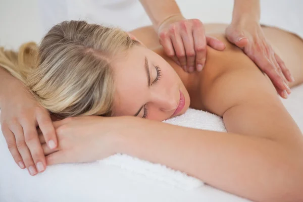 Pretty blonde enjoying a massage — Stock Photo, Image