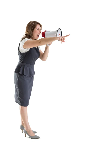 Young woman shouting into bullhorn as she gestures — Stock Photo, Image