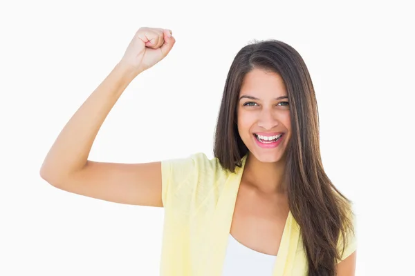 Happy casual woman cheering at camera — Stock Photo, Image