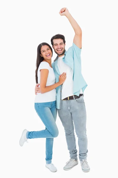 Feliz pareja casual animando a la cámara — Foto de Stock