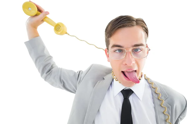 Geeky zakenman wordt gewurgd door telefoonkabel — Stockfoto