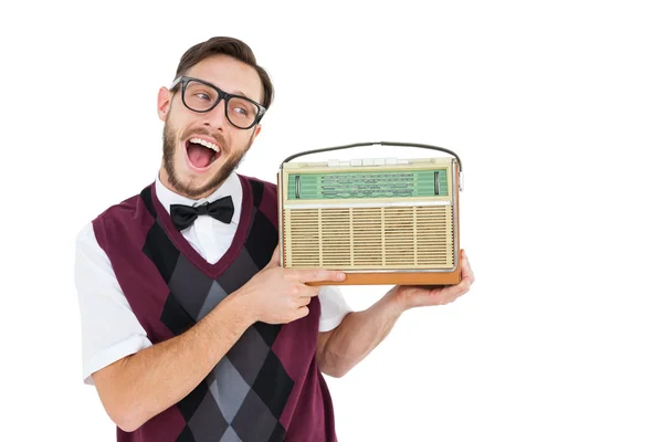 Geeky hipster holding a retro radio — Stock Photo, Image