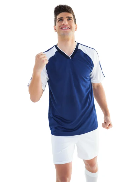 Football player in blue celebrating — Stock Photo, Image