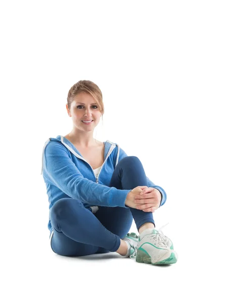 Portrait of a smiling fit young woman — Stock Photo, Image