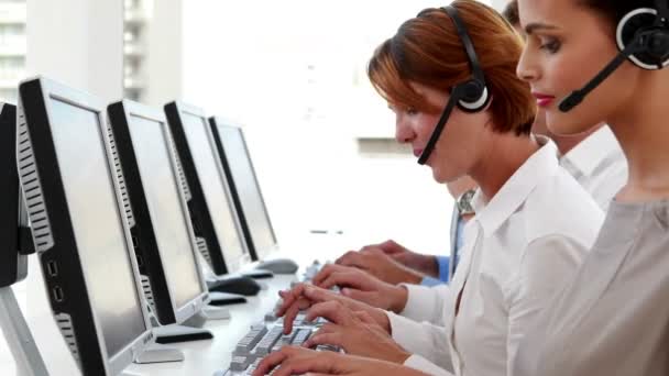 Happy call center employees at work — Stock Video