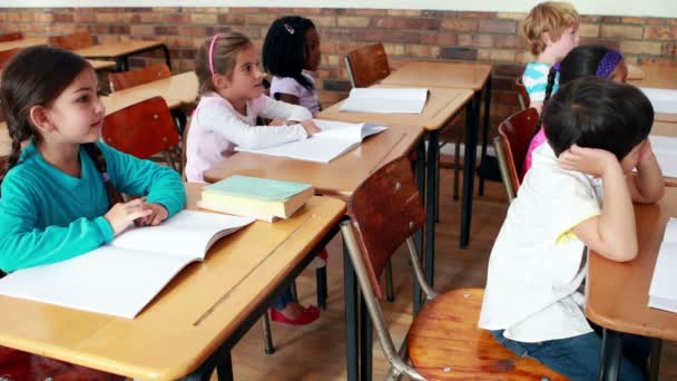 Little children listening in classroom — Stock Video