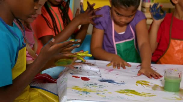 Pupils painting with their hands — Stock Video