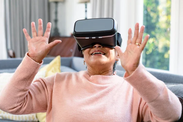 Happy Mixed Race Senior Woman Wearing Headset Having Fun Retirement — Stock Photo, Image