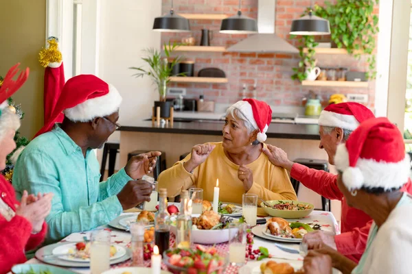 Diverse Group Happy Senior Friends Holiday Hats Celebrating Christmas Together — Stock Photo, Image