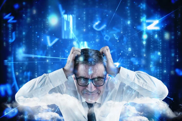 Stressed businessman touching his head — Stock Photo, Image